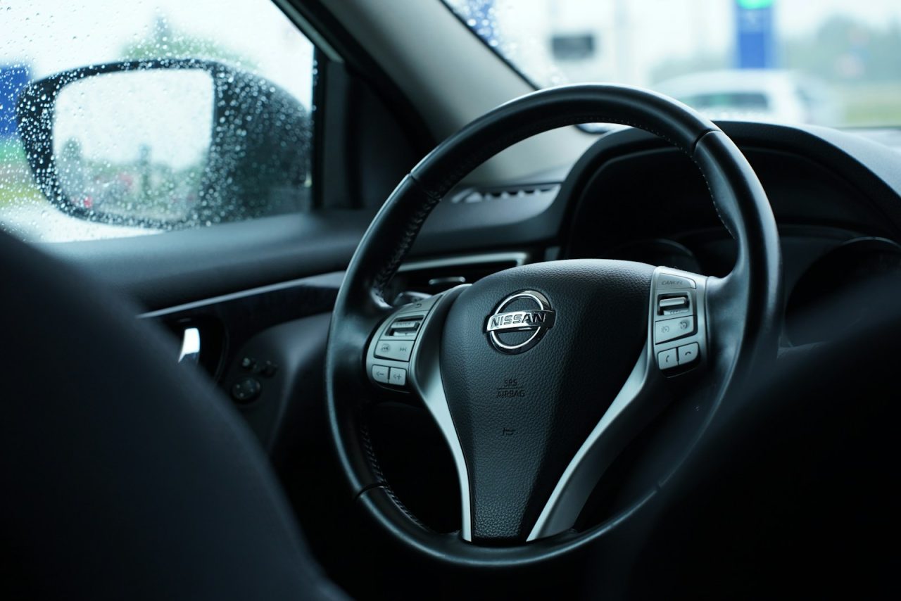 a steering wheel and dashboard of a vehicle