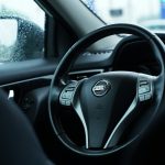 a steering wheel and dashboard of a vehicle